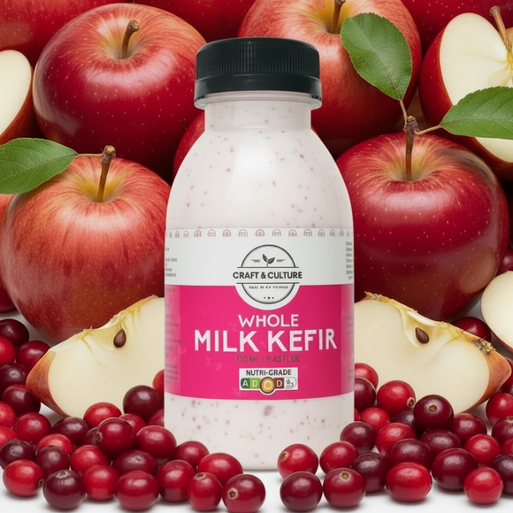 cranberry apple kefir on a background of cranberries and apples